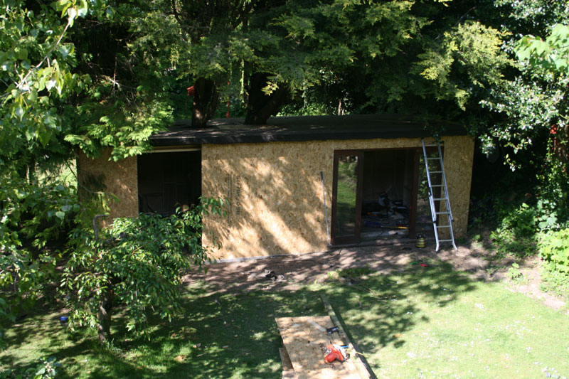 Once the frame was done, the roof was put on, felted and the OSB boards covered the timber frame.